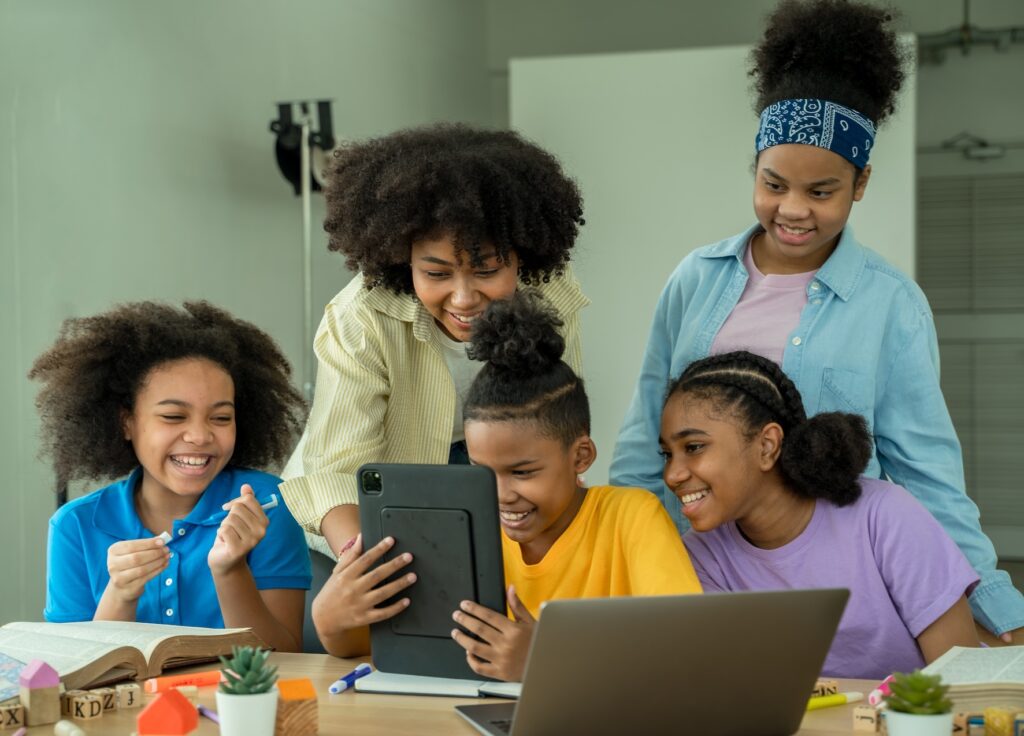 chool children using digital tablet computer learning